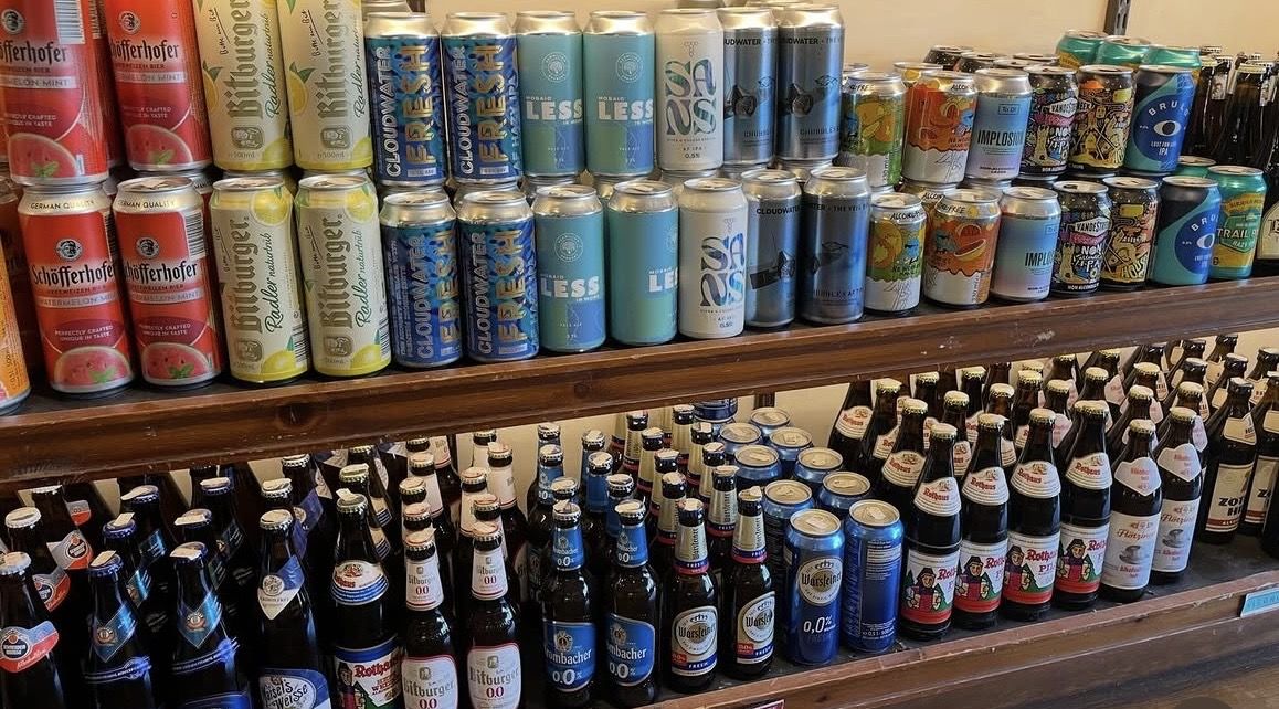 Independent off-licence shelf of alcohol-free beers including Lervig, To Øl, VandeStreek, Brulo, Sierra Nevada, La Trappe, Jupiler and German bottles