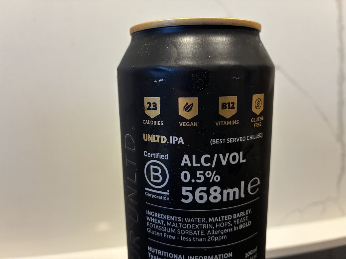 The back of the UNLTD IPA can showing 23 calories, vegan, B12 and gluten-free badges